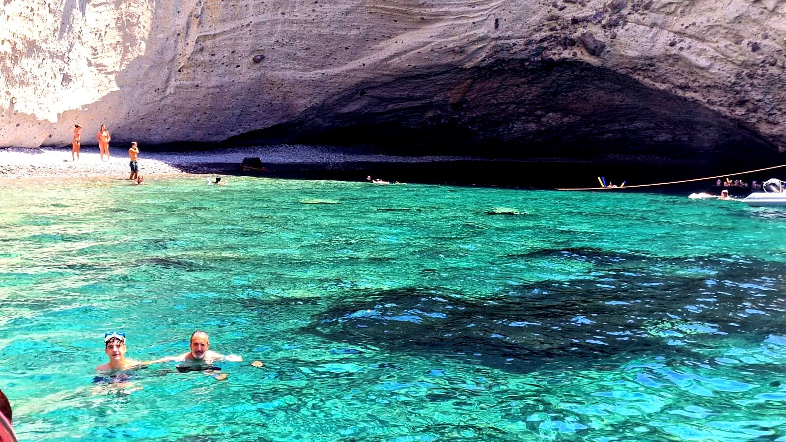 Swimming outside the pirate cave of Antiparos