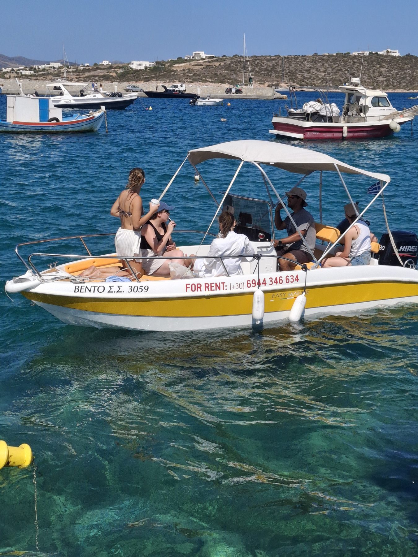 Bento with guests on board off Alyki, Paros