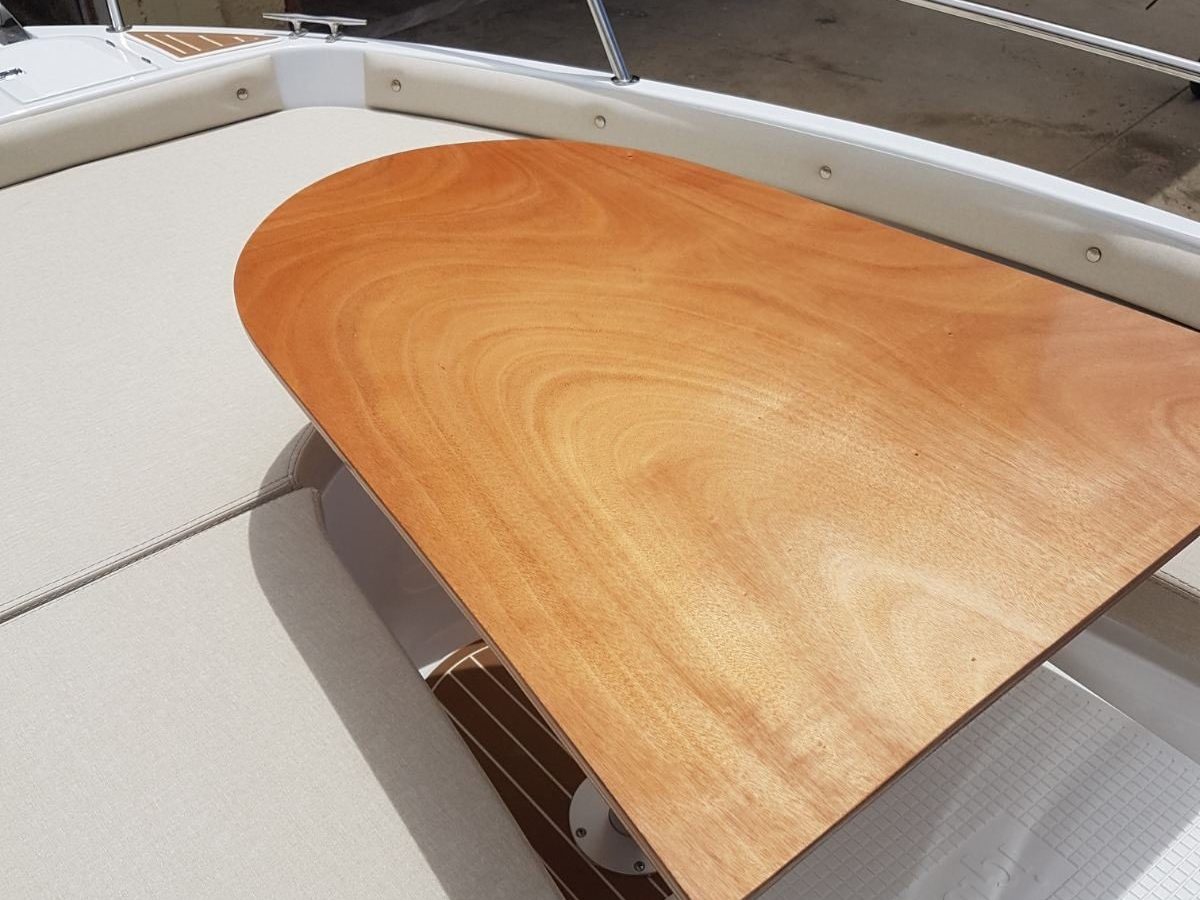 The wooden dining table on board Marre II