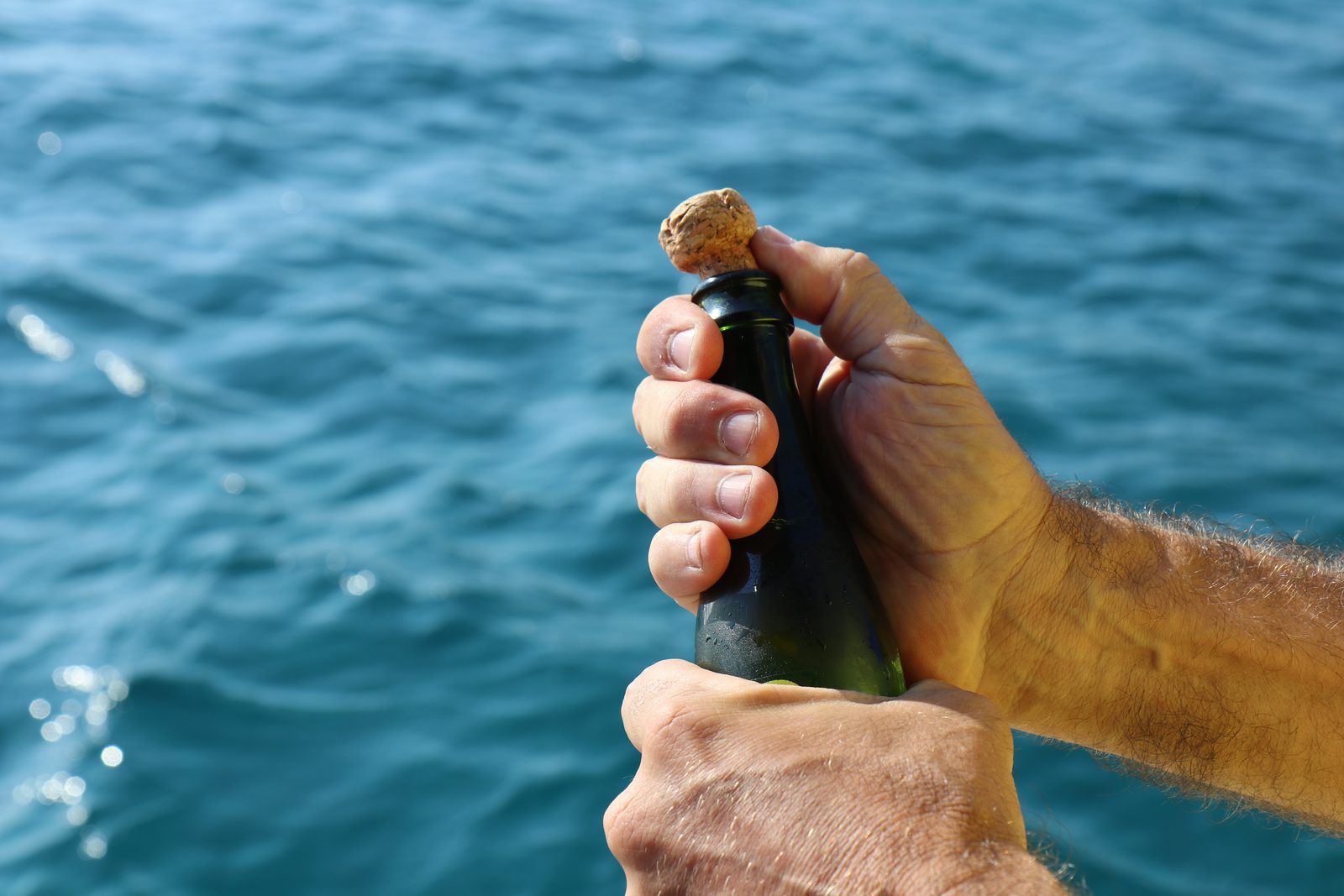 A celebration on board with the sea behind