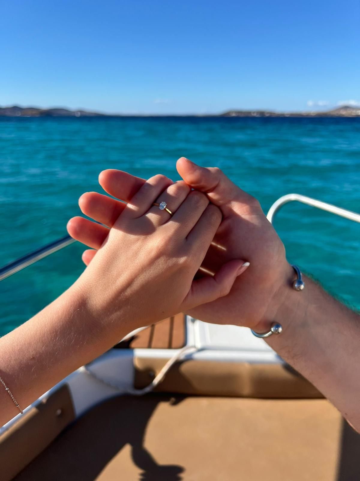 A quiet moment on board over turquoise water off Paros