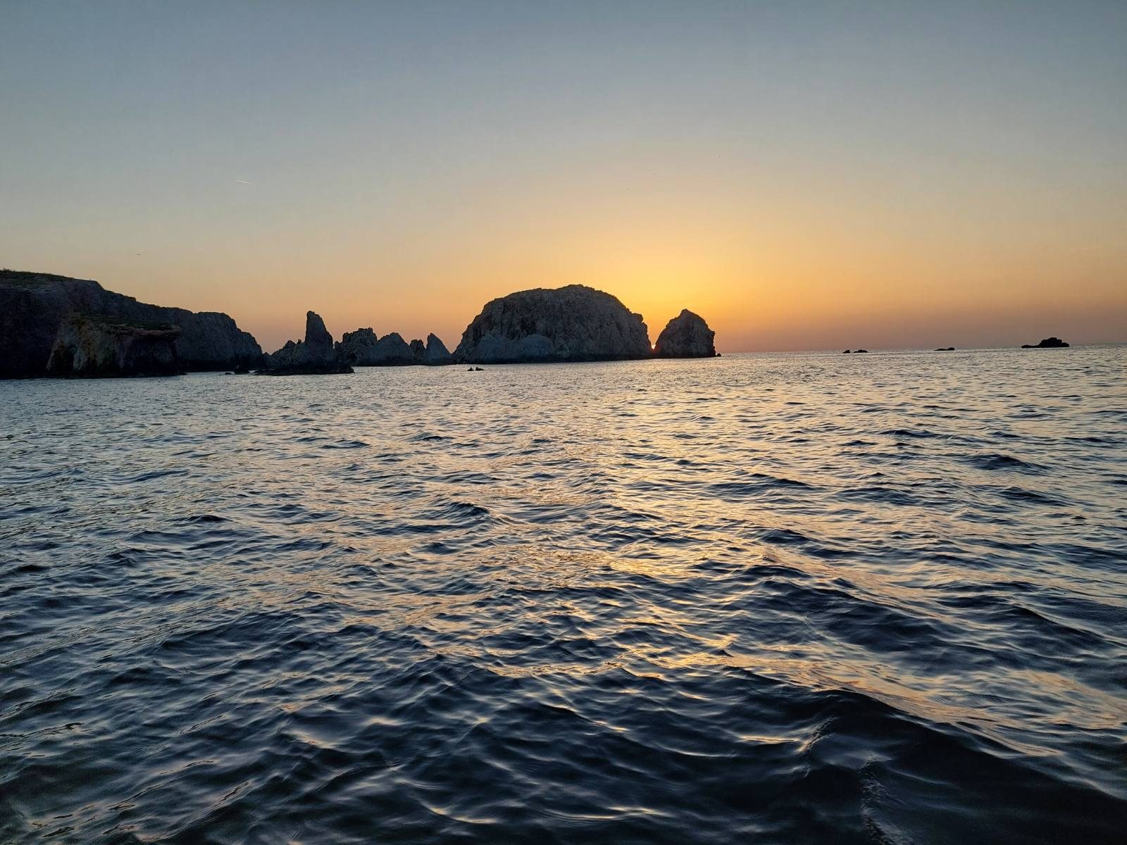 Sunset behind the islets off Paros
